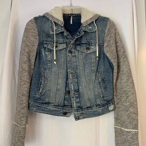 Free People distressed denim jacket with gray fleece hood and sleeves